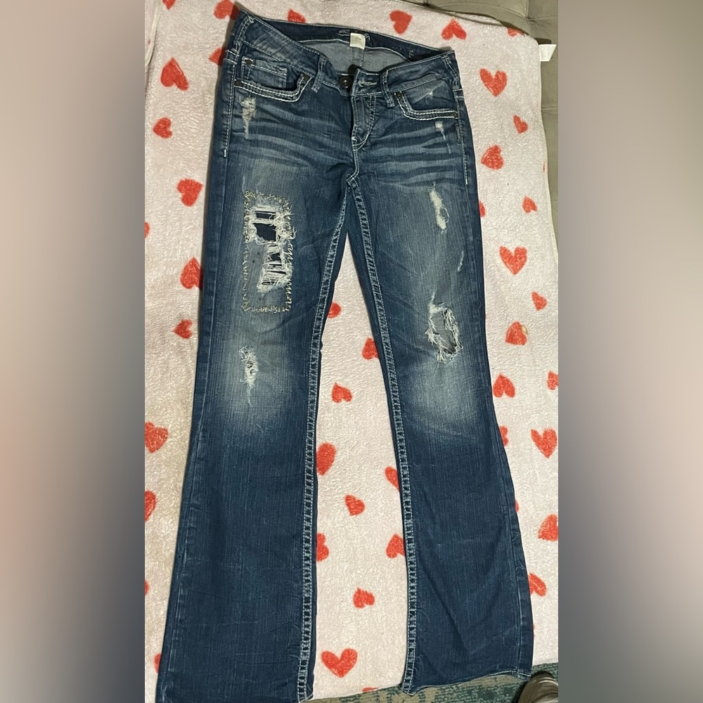 Distressed Blue Jeans
